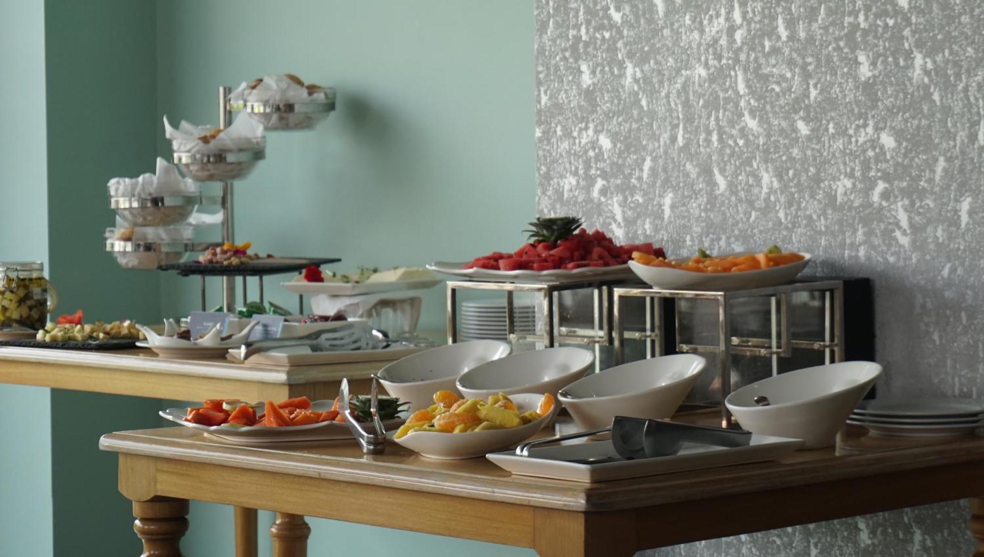 Quo Quality Hotel Manizales Dış mekan fotoğraf A buffet